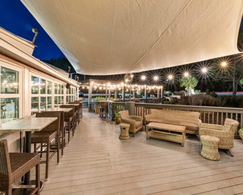 Cozy outdoor patio with lights at night