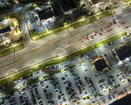 Aerial night view of busy city intersection