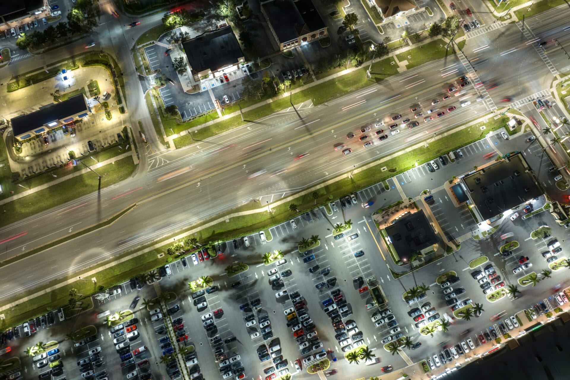 Aerial night view of busy city intersection