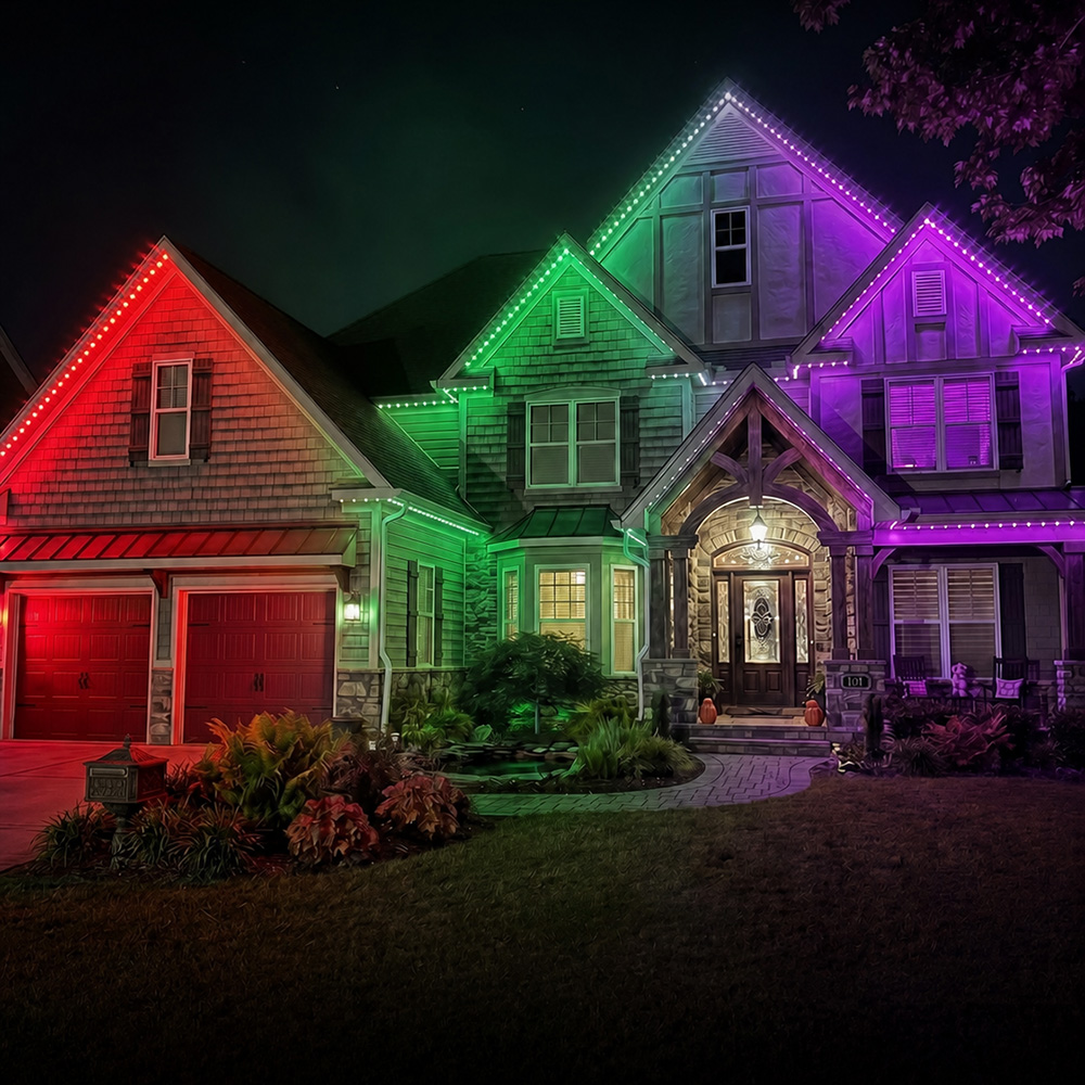 House illuminated with colorful LED lights at night